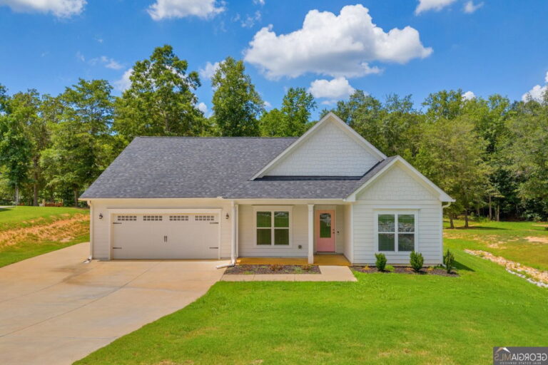 Single-hung vinyl window installation on a modern home exterior, showcasing energy-efficient features and custom design options available from Windowcrafters.